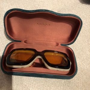 Gucci sunglasses.